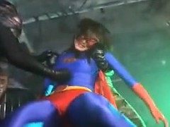 super-heroine-is-caught-and-gets-tied-up-and-her-boobs-sque
